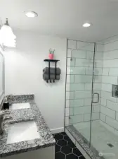 Primary Bathroom with double sinks and stunning walk in shower!