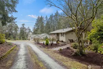 There are plenty of places/spaces in this yard to create a garden or whatever else you might enjoy. This home as so much to offer.