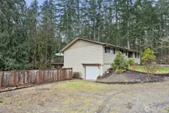 A deep one-car garage is a easy place to pull into to unload supplies without getting wet.