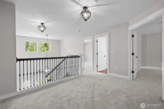 Upstairs landing with view of Jack and Jill bed and bath.