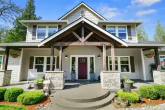 Front view with welcoming fronp porch.