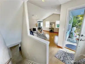 The lower level access is easily accessible just off the entry hall.