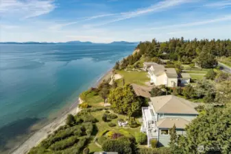 The home sits back from the bluff with views of the Puget Sound and the San Juan Islands in the distance. The back yard gardens allows you to sit in privacy and enjoy the views as well.