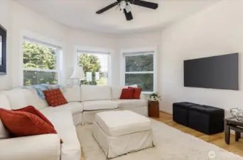 Next to the Living Room area is separate TV sitting/viewing area with views out to the front yard.
