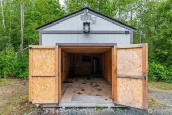 Ready for storage or as a place to stage your building supplies, the on site shed has the electrical panel installed and a 220V outlet.