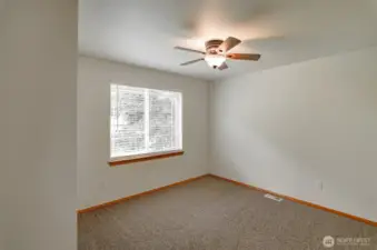 Another view of bedroom 2.  Both upper bedrooms have ceiling fans.