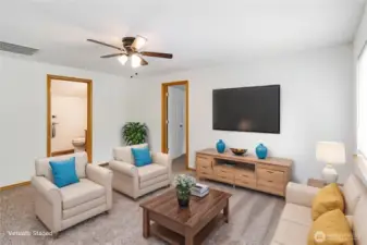 Upper level bonus room makes a wonderful TV room or play room.