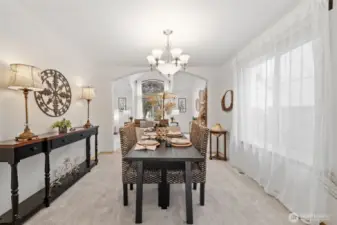 Large window for lots of natural light looks out to side yard.