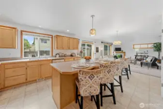 Kitchen window looks out to the expansive backyard and deck - perfect for outdoor entertaining.