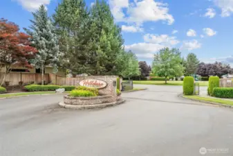 One of several gated entrances into the community.
