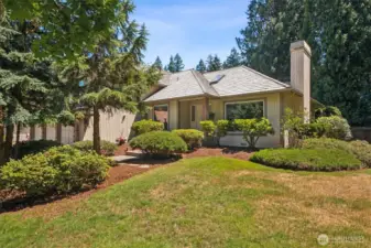 Checking out this front view. Large lot, shy 1/3 acre.