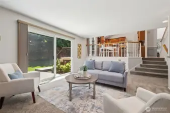 Looking back the whole house is connected for easy entertaining. Slider to the left here takes you out to the extended patio in the backyard.