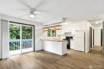Dining. 6' sliding glass door. East.  Forest views.