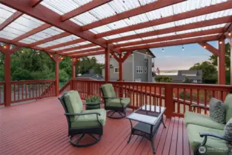 Covered back deck with a view of Dyes Inlet great for the northwest entertaining...