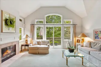 Main-level living room with gas fireplace