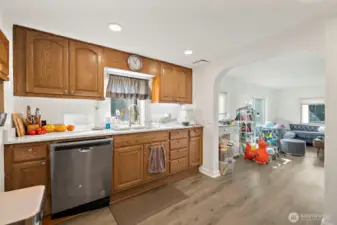 Kitchen with stainless steel dishwasher.