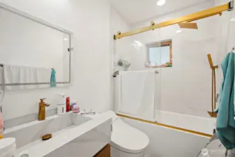 Newly added full bath in the primary bedroom.