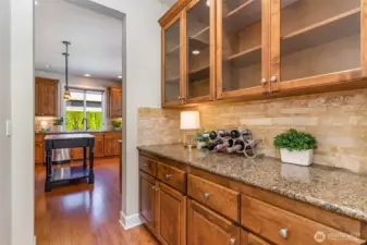 Butlers pantry provides ample cabinet space.