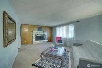 Another angle of the livingroom with its own fireplace