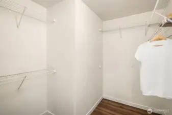 Large walk in closet in primary suite.