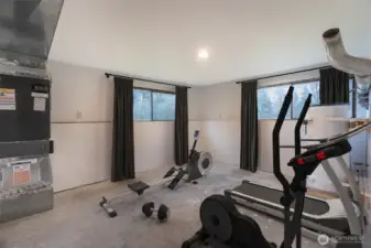 Utility / Laundry Room  Lower  Virtually Staged as Gymn