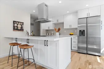 Expansive kitchen island, perfect for casual dining and serving buffet style