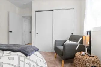 Separate from the other bedrooms, this considerable sized bedroom with new carpeting feels private