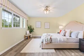 Large Primary bedroom has beautiful view of the mountains