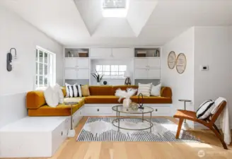 Living room with built in cabinets and seating area
