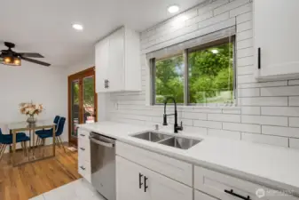 All new countertops, tile, fixtures & appliances!