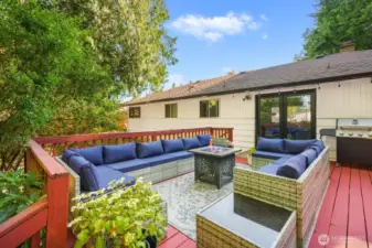 French doors from kitchen open up to the enormous deck!