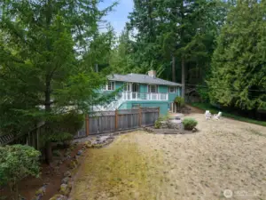 Expansive, sun-filled yard with plenty of open space.