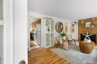 Open living room filled with natural light.