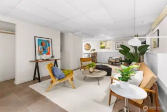 Open bonus room on lower level with French doors to outdoor patio.