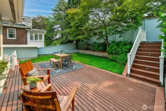Easy access to the level backyard ~ fully fenced and the stairs lead you to the alley and garage.