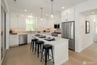 This cottage home does not lack for cabinets and storage. Gas range for those who love to cook.