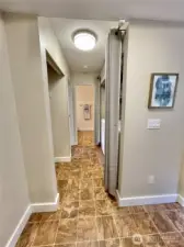 Hallway to bedroom, bathroom and laundry
