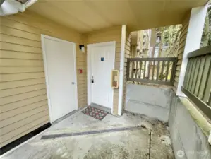 Covered front patio with storage closet