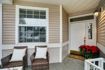 Covered front porch with western exposure.