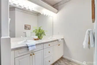 Dual vanity in primary bathroom.