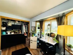 Front bedroom with bay windows, LVP flooring, large wall closet, full bathroom next door