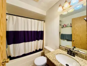 Main bathroom located between bedrooms 2 and 3