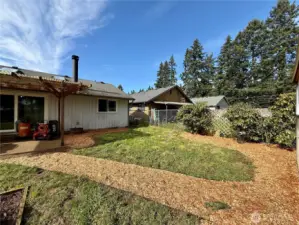 7703 NE 159th Pl, Vancouver provides a large fully fenced backyard, outbuildings, covered patio, making it an easy commute using I205 and SR500