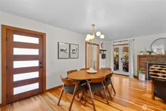 Beautiful dinning area welcomes you home with the gorgeous original hardwood  floors open to living space.