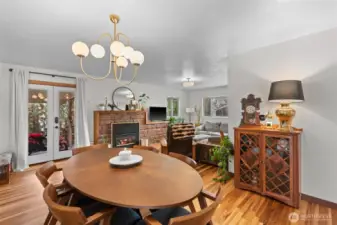 Dinning area enjoyed with open seating next to the cozy gas fireplace.