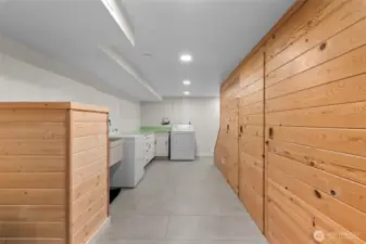 laundry space with storage and countertop space.