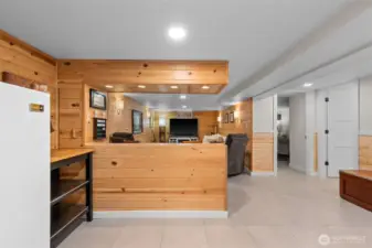 This downstairs den type feel is gifted with an additional room and bathroom.