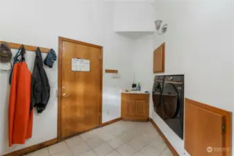 Utility room with built in washer/dryer