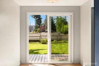 house is virtually staged so this is the dining area looking into backyard