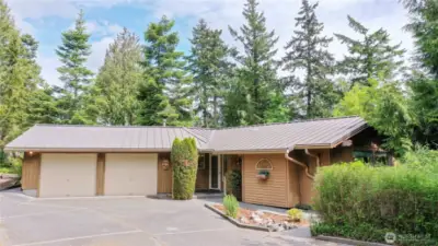 Great 2 car garage, circular drive and great additional parking.